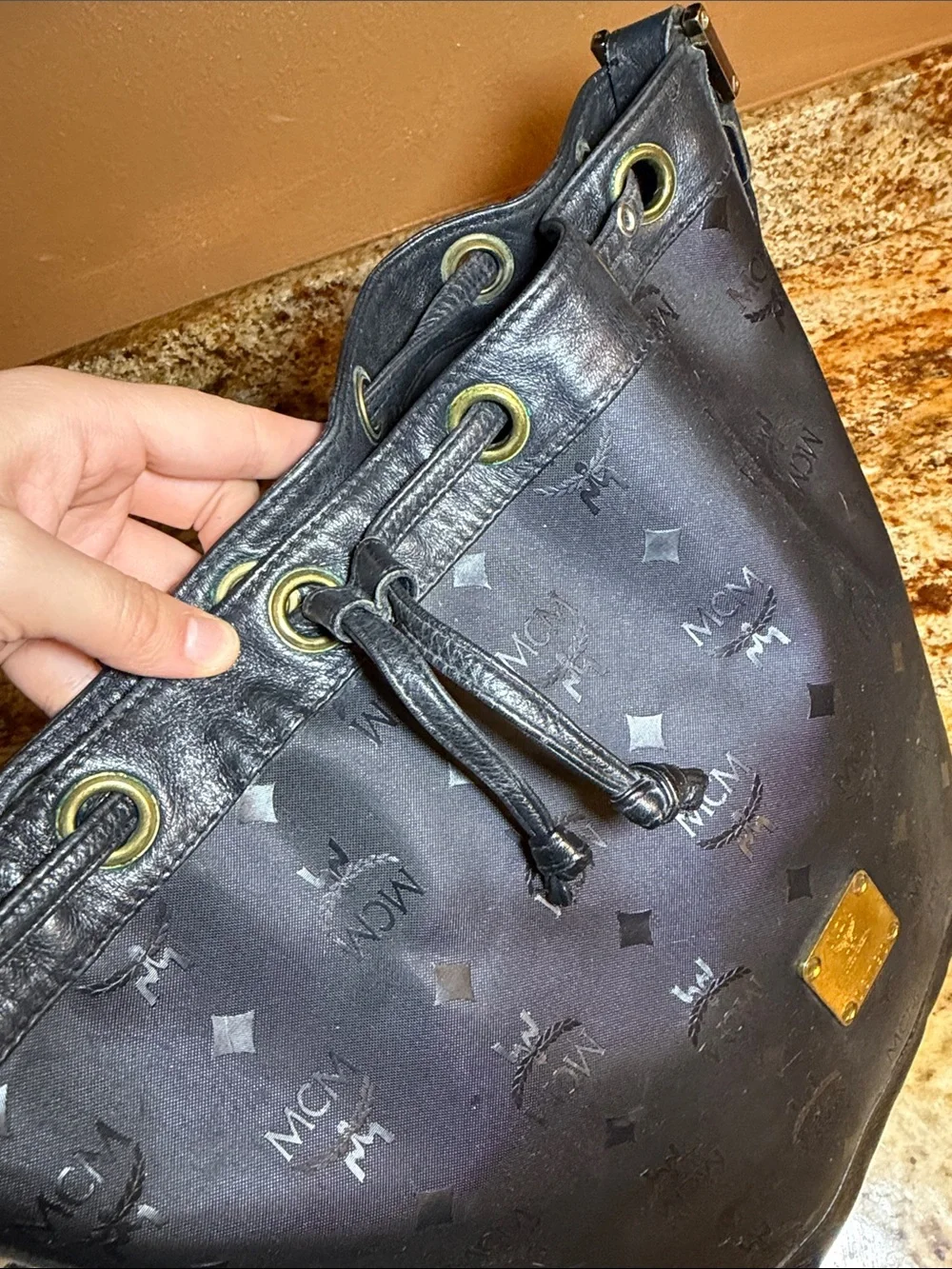 MCM Black Monogram Drawstring Bucket Hobo with Gold Plate
